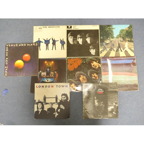 41 - Four Beatles albums including Rubber Soul and Abbey Road; also five further albums by the artists as... 