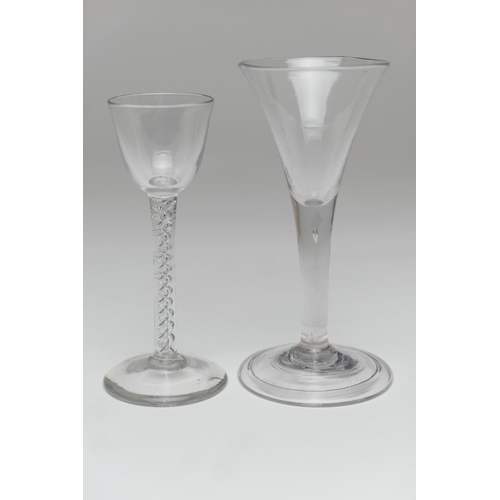 13 - George III wine glass, circa 1770, trumpet bowl over a solid stem with a single small tear, over a f... 