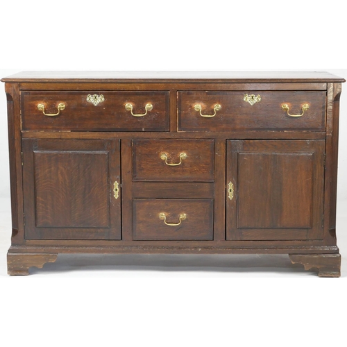734 - Late George III oak enclosed dresser, circa 1800-20, fitted with two long drawers and two central sh... 
