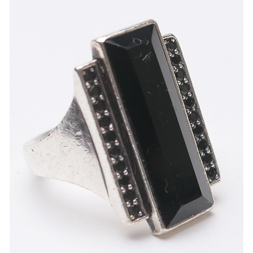 442 - Georg Jensen Nocturn silver ring, in Art Deco style inset with black onyx flanked by two rows of rou... 