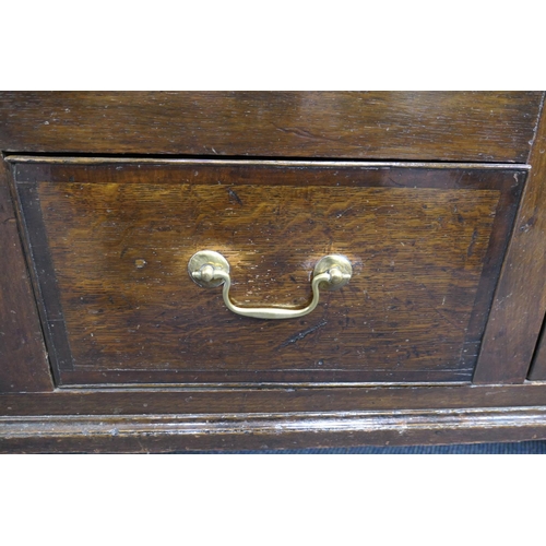 734 - Late George III oak enclosed dresser, circa 1800-20, fitted with two long drawers and two central sh... 