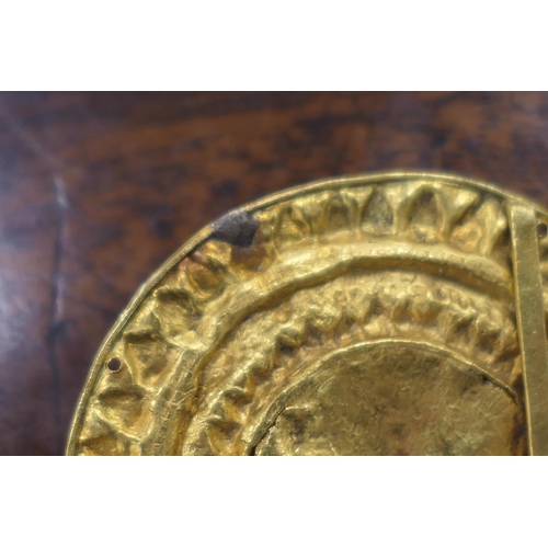 370 - Pair of antique gold mounts, circular form centred with a mask of Zeus, within a radial punched bord... 