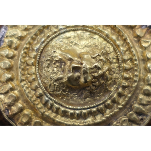 370 - Pair of antique gold mounts, circular form centred with a mask of Zeus, within a radial punched bord... 