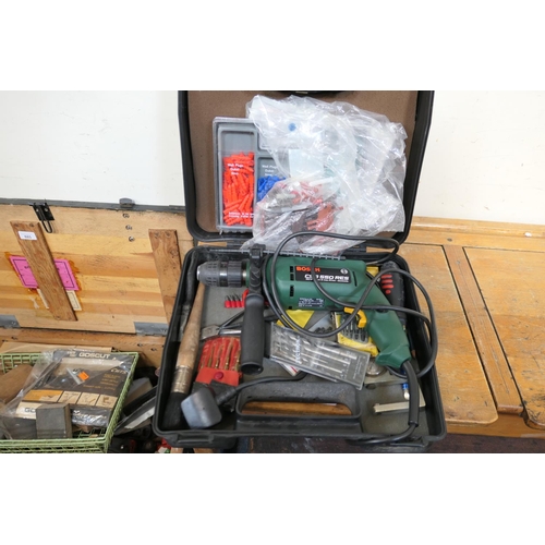 686 - Bosch power drill, cased with accessories