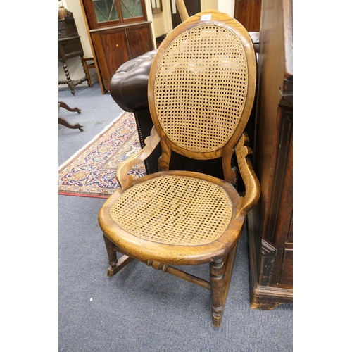 765 - Victorian caned elm rocking chair