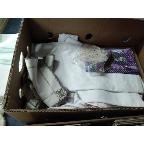 92 - Box of linens including table cloths, handkerchiefs, ties etc (2 boxes)