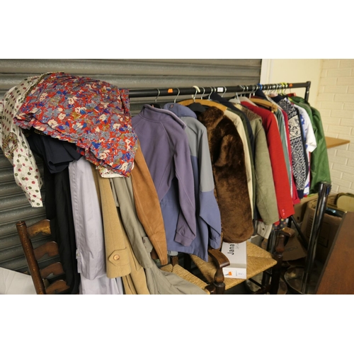 116 - Good quantity of ladies' clothing including a fleece lined suede overcoat, further jackets, jumpers,... 