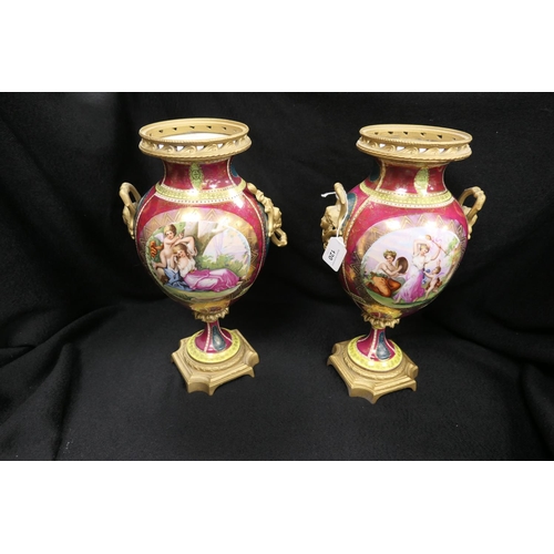 120 - Decorative pair of Vienna style ormolu mounted pedestal vases (with damages and without covers)