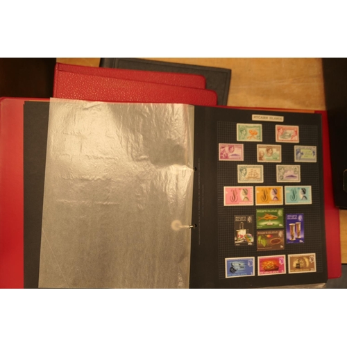 384 - Four well presented stamp albums including numerous Mint stamps, British from George V and mixed col... 