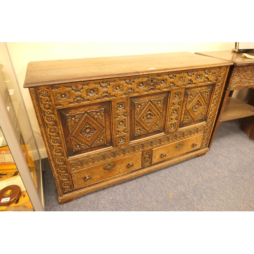 404 - 18th Century oak mule chest with later carved decoration