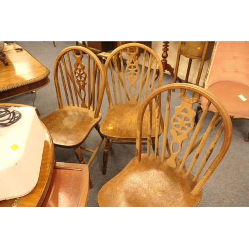 457 - Set of four wheel back kitchen chairs