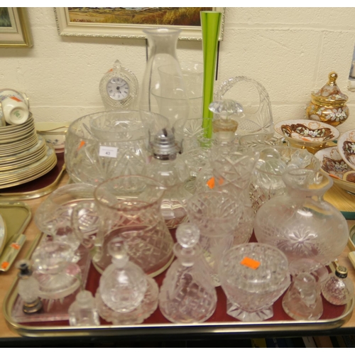 43 - Quantity of mixed cut and moulded glass wares including punch bowl, mantel clock, table basket, nume... 