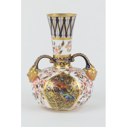 1 - Crown Derby Porcelain Persian style imari vase, circa 1878, baluster form with twin mask handles, de... 