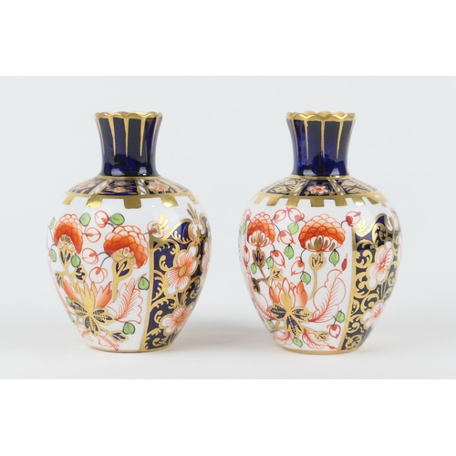 15 - Pair of Royal Crown Derby small ovoid vases, circa 1910/12, each decorated in imari colours, pattern... 