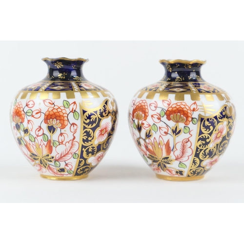 16 - Pair of Royal Crown Derby ovoid vases, circa 1906/07, shouldered ovoid form with short neck, decorat... 