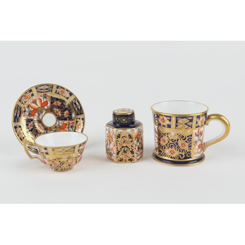 23 - Royal Crown Derby miniature tea cup and saucer, circa 1912, pattern 2451, printed marks, height 3cm;... 