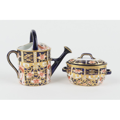24 - Royal Crown Derby miniature tureen and cover, circa 1912, pattern 6299, 5cm; also a Royal Crown Derb... 