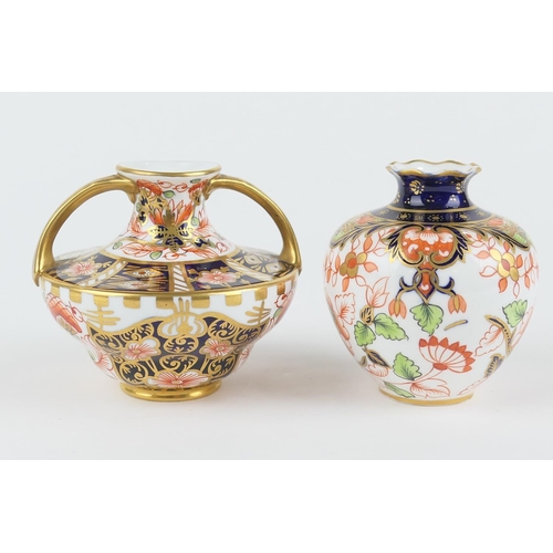 25 - Royal Crown Derby small twin handled vase in Etruscan shape, decorated in imari colours, pattern 629... 