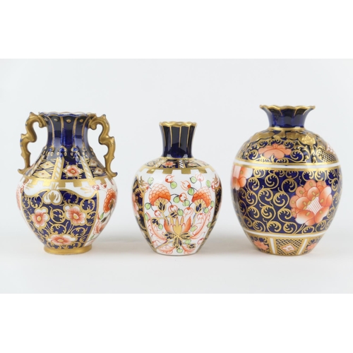 35 - Royal Crown Derby imari moulded bottle vase, circa 1899, pattern 920/919, printed marks, 9.5cm; also... 