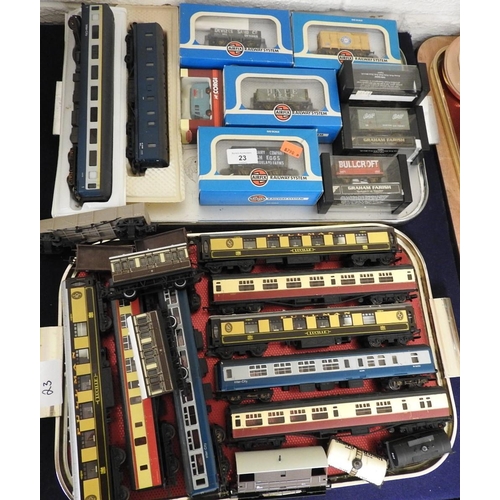 23 - Assorted 00 gauge coaches and rolling stock including Hornby, Mainline and Graham Farish and a track... 