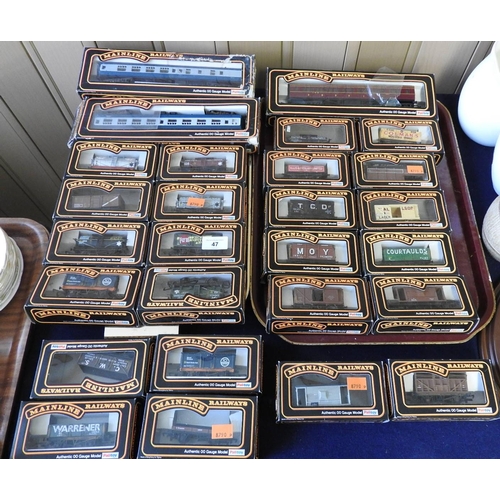 47 - Number of Mainline 00 gauge rolling stock and passenger coaches, all boxed (27)