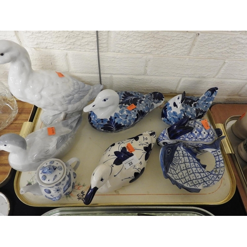 22 - Blue and white pottery ducks, hens; also a miniature embossed teapot (1 tray)