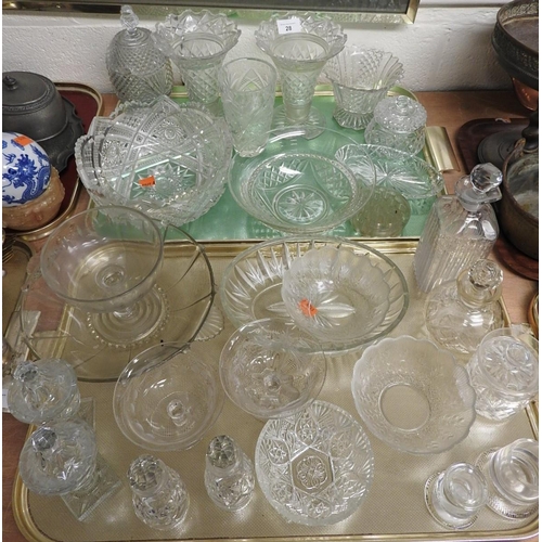 28 - Assorted cut glassware including a cut glass fruit bowl, vases, lidded and pedestal mounted preserve... 