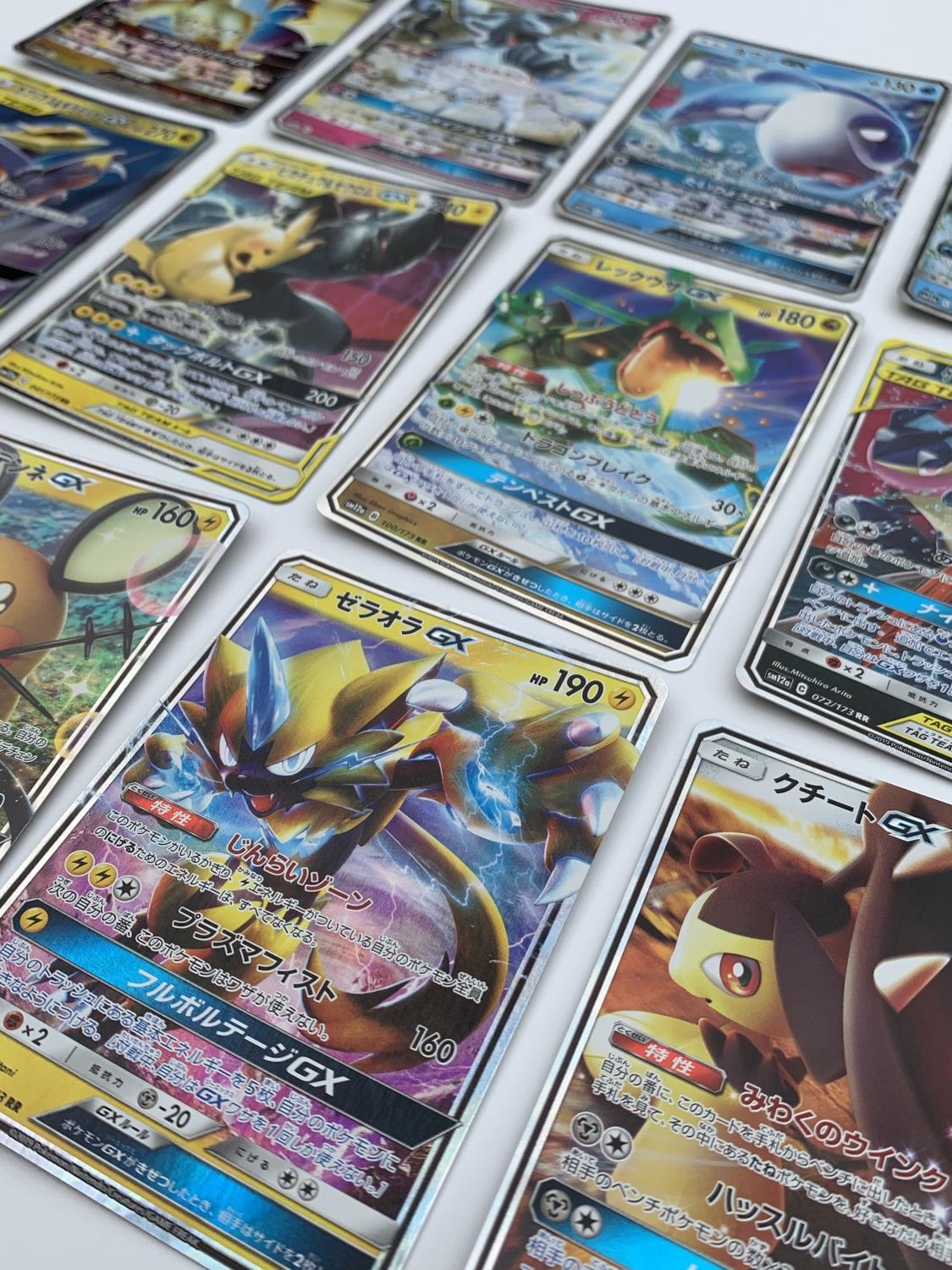 A Selection of 12 Japanese Pokemon Tag Team All Stars GX Cards