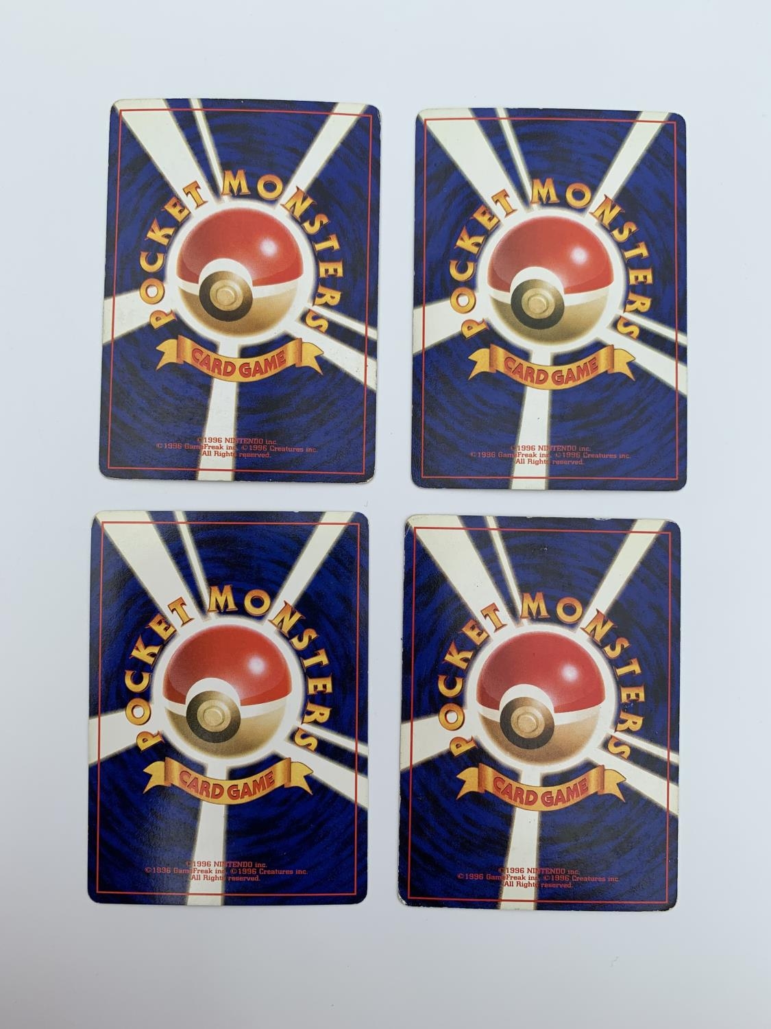 A Set of 4 Japanese Pokemon 'Pocket Monsters' Base Set Holographic Cards