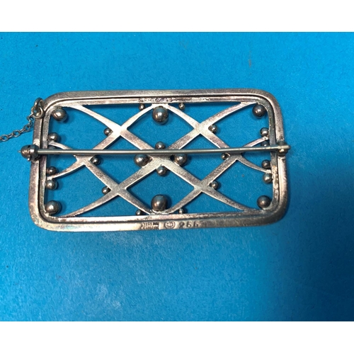 344 - A silver rectangular brooch with ball and lattice work panel, by Georg Jensen, No 266