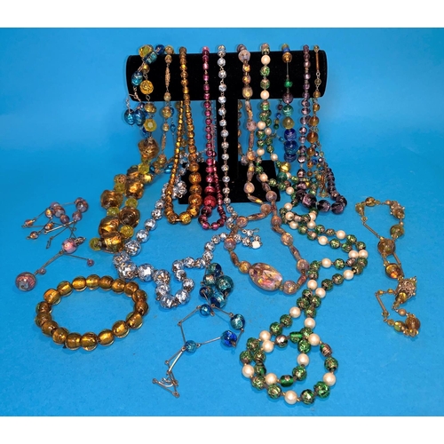 312 - A selection of mid 20th century foil bead necklaces