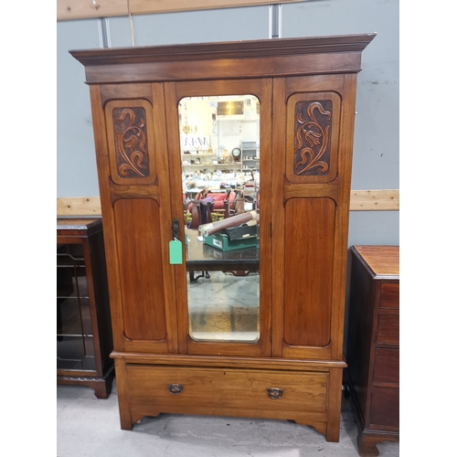 An Edwardian Single Mirror Door Wardrobe With Drawer To Base