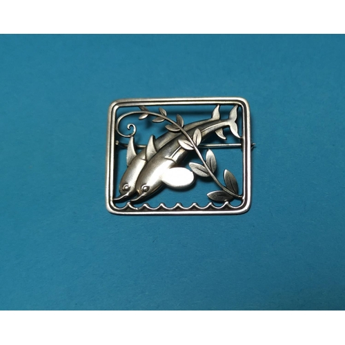 385A - A Georg Jensen brooch marked 251 featuring two dolphins jumping and olive branch stamped 925 Sterlin... 