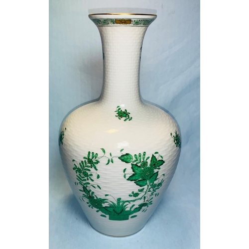 129 - A Herend vase hand painted with green floral decoration, gilt rim and foot, height 27 cm
