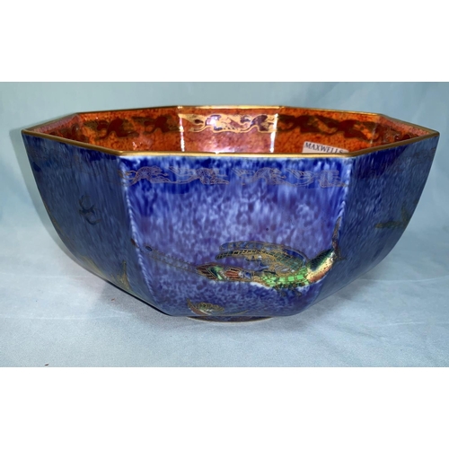 154 - A 1930's Wedgwood octagonal lustre bowl decorated with birds of paradise against blue externally, an... 