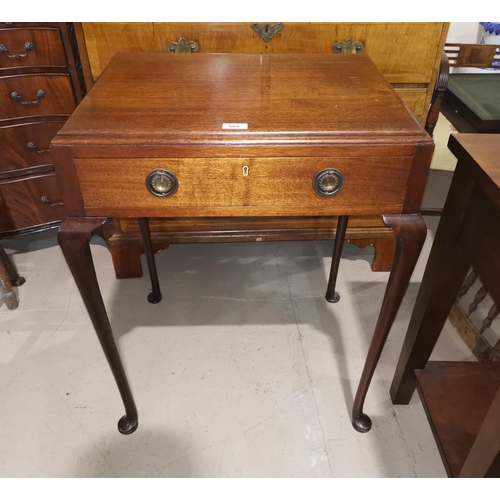 604 - An early 20th century mahogany side table with frieze drawer, on cabriole legs, width 61 cm