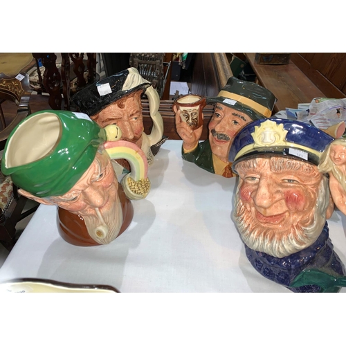 123 - Four large Royal Doulton large character jugs:  Sir Francis Drake; The Collector, signed by Kevin Fr... 
