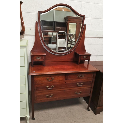 579 - An Edwardian inlaid mahogany dressing table of 2 long, 2 short and 2 jewellery drawers, with stool