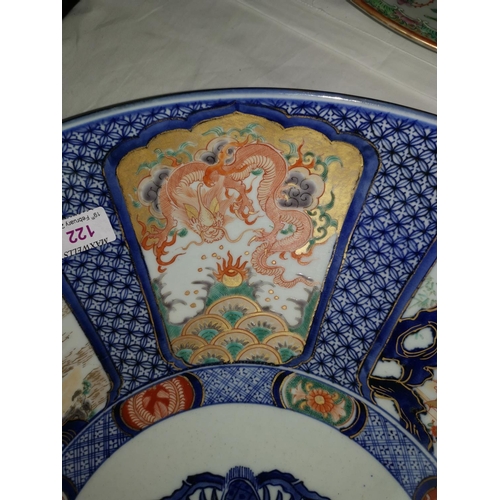 122 - An impressive 19th century Japanese Imari porcelain saucer dish of large size decorated in underglaz... 