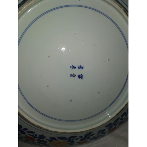 122 - An impressive 19th century Japanese Imari porcelain saucer dish of large size decorated in underglaz... 