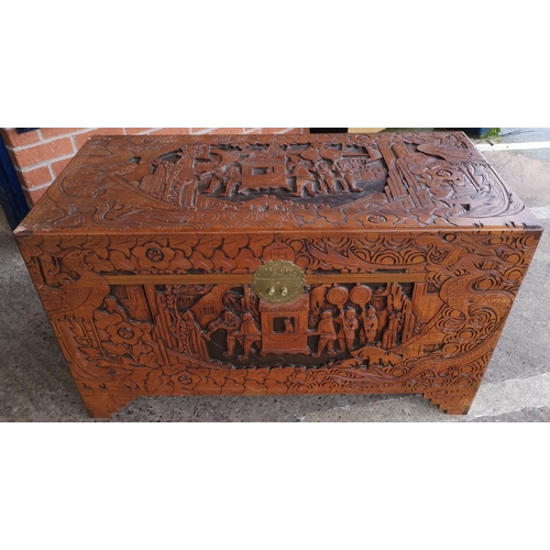 A Large Oriental Carved Camphor Wood Chest With Extensive Carving