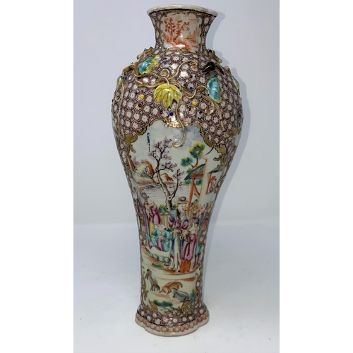 314a - A Chinese porcelain vase with enamel decoration of traditional scenes, relief of leaves and vines to... 