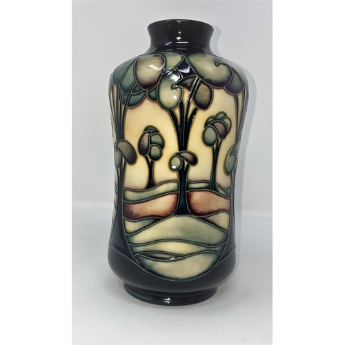221 - A modern Moorcroft vase of waisted form, decorated with stylized trees by Sian Leeper, height 20 cm