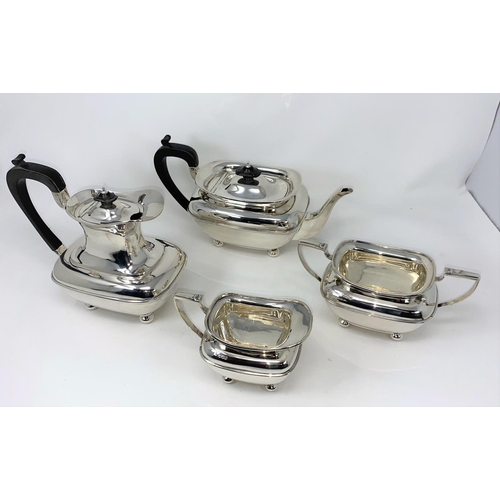 384 - A hallmarked silver Georgian style 4 piece tea set of rounded rectangular form, on 4 ball feet, Shef... 