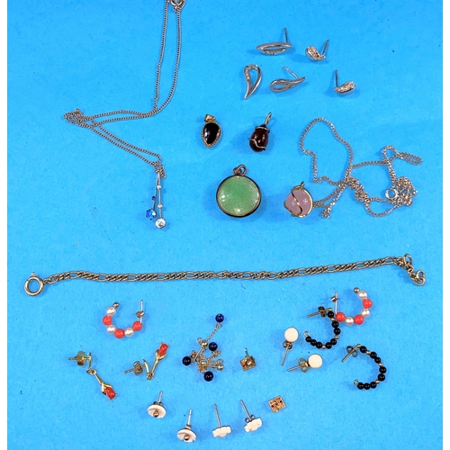 562 - 8 pairs of earrings, some marked 375 or 9 carat, white metal pendant, other similar pendants etc