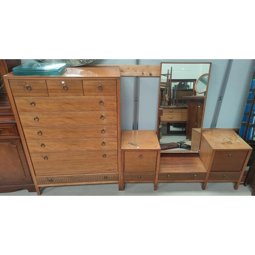 753 - A 1960's sapele 2 piece bedroom suite comprising 7 height chest of drawers and dressing table