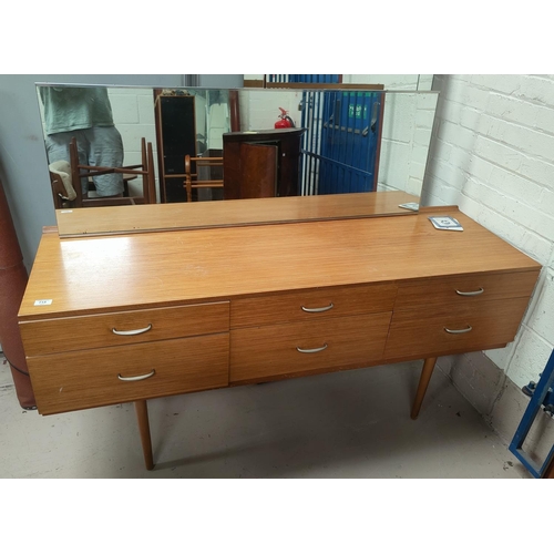 773 - A mid 20th century lightwood dressing table with 6 drawers, single long mirror, on tapering legs wit... 