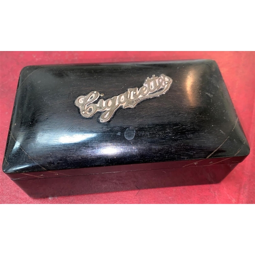 539 - An ebony cigarette box, cigar clippers, Mortons patent silver plate Vesta, 800 silver enamel souveni... 