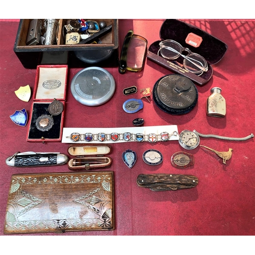 539 - An ebony cigarette box, cigar clippers, Mortons patent silver plate Vesta, 800 silver enamel souveni... 