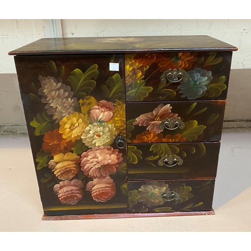 763 - An oriental small lacquered cabinet with cupboard and 4 drawers